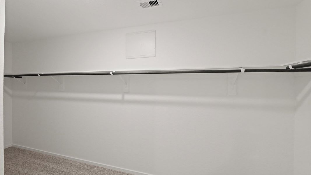 Representative unfurnished interior of a home built from the Estero by D.R. Horton in Lake Conroe Cove, Willis (Image 29). Representative unfurnished interior of a home built from the Estero by D.R. Horton in Lake Conroe Cove, Willis (Image 29).