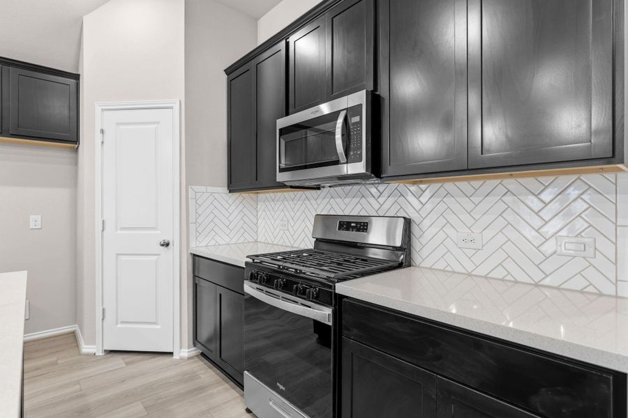 Furnished interior view inside a new home in Grand Central Park, Conroe (Image 5).