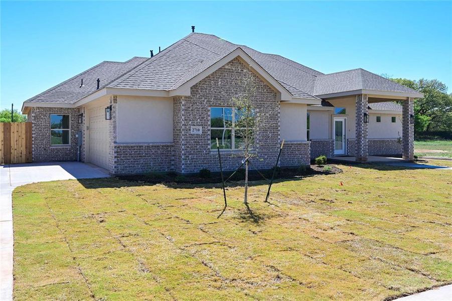 Front exterior of a new home in , Abilene, TX, highlighting curb appeal (Image 29).
