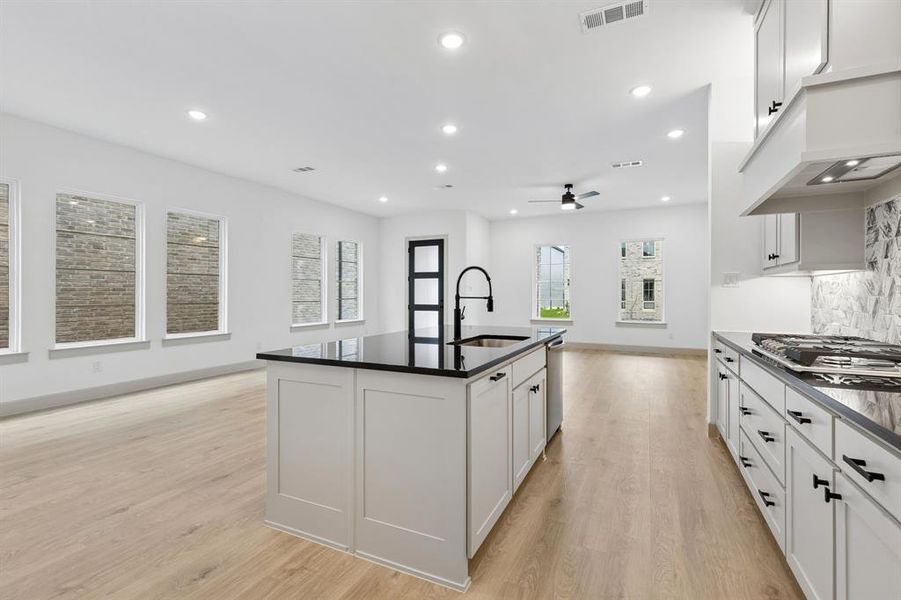 The chef in the family will never be left out of the party in this dream home!