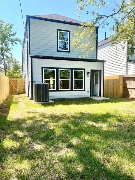 Spacious back yard with shade. Spacious back yard with shade.