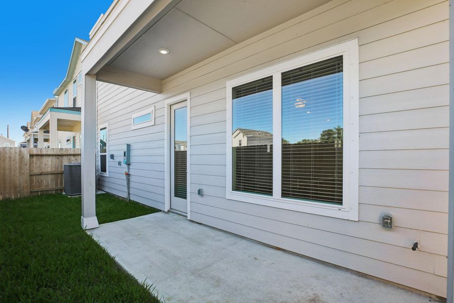 Exterior details and patio area of a home in Kemah Crossing - Luxe Series, Kemah (Image 3).