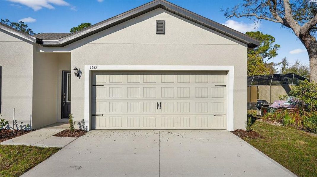 Front exterior of a new home in , Deltona, FL, highlighting curb appeal (Image 21).