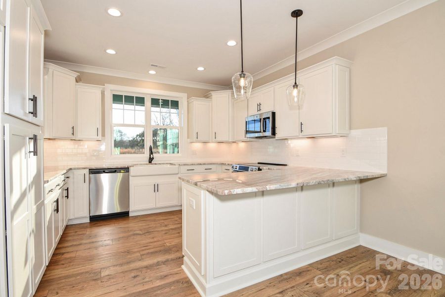 Furnished interior view inside a new home in , Wingate (Image 5).