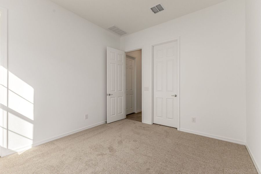 Spacious, unfurnished interior of a new home in Empire Pointe, Queen Creek (Image 14).