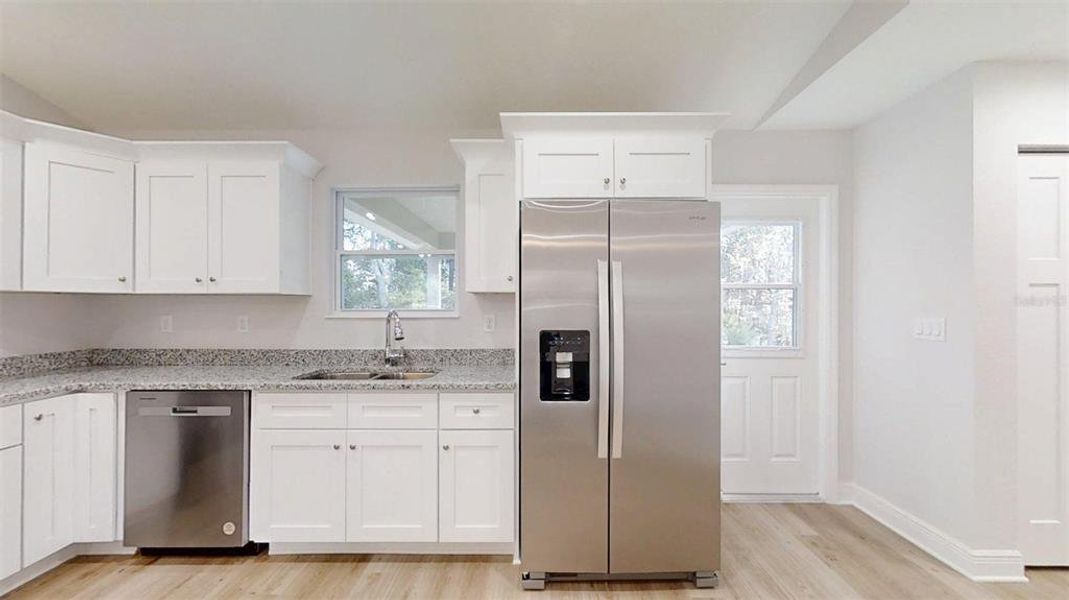 Furnished interior view inside a new home in , Dunnellon (Image 6).
