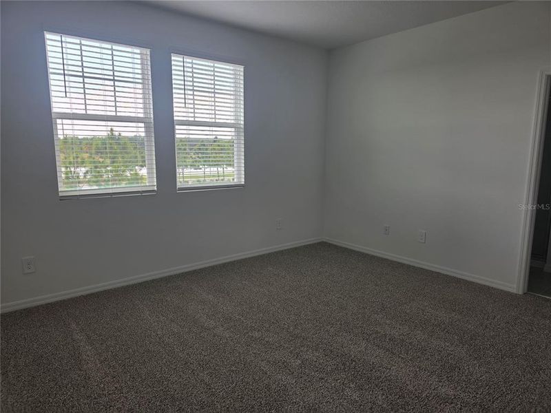 Spacious, unfurnished interior of a new home in The Meadow at Crossprairie Bungalows, St. Cloud (Image 22).