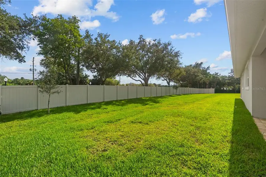 Exterior details and patio area of a home in , Tarpon Springs (Image 28).
