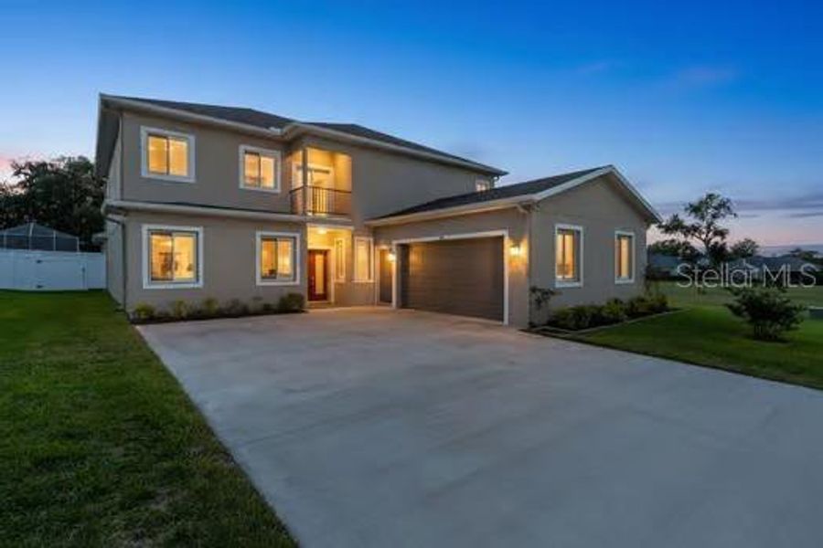 Front exterior of a new home in , Lakeland, FL, highlighting curb appeal (Image 2). Front exterior of a new home in , Lakeland, FL, highlighting curb appeal (Image 2).