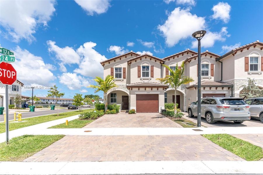 Front exterior of a new home in , Miami, FL, highlighting curb appeal (Image 17).