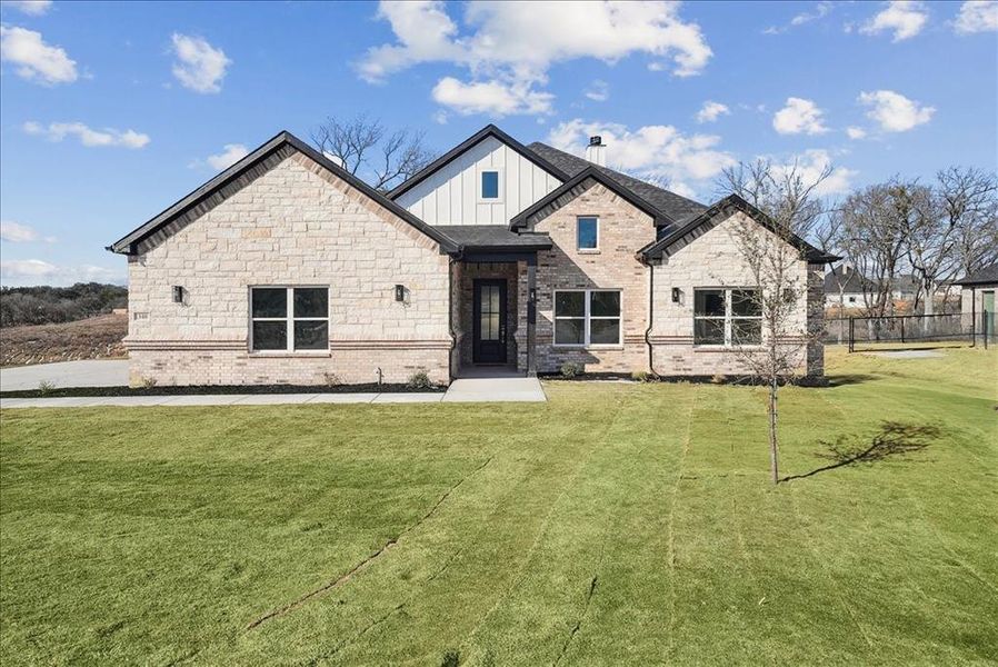 Front exterior of a new home in , Azle, TX, highlighting curb appeal (Image 1). Front exterior of a new home in , Azle, TX, highlighting curb appeal (Image 1).