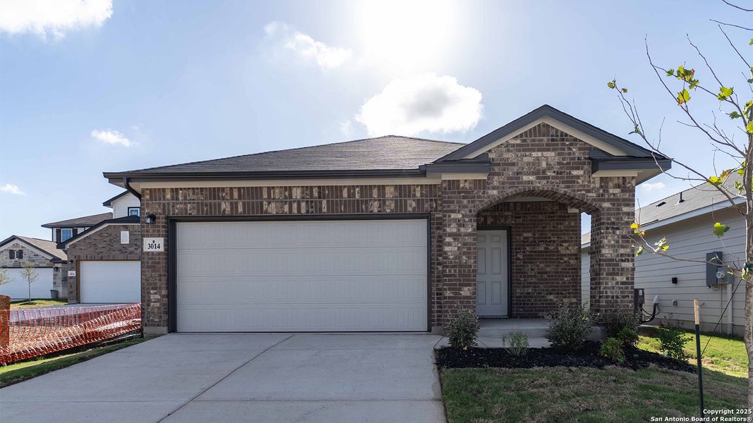 Front exterior of a new home in Katzer Ranch, Converse, TX, highlighting curb appeal (Image 1).