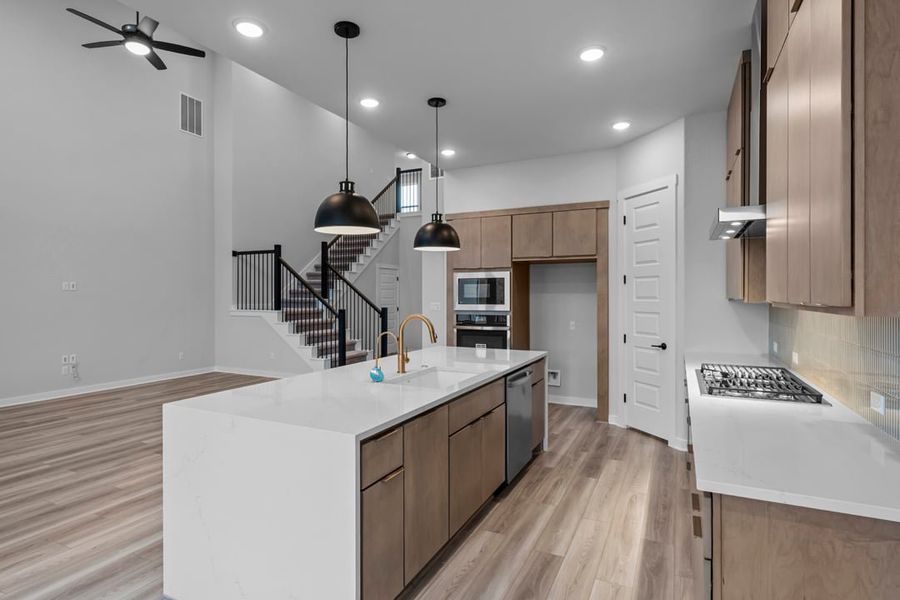 Furnished interior view inside a new home in Park Collection at Lariat, Liberty Hill (Image 13). Furnished interior view inside a new home in Park Collection at Lariat, Liberty Hill (Image 13).