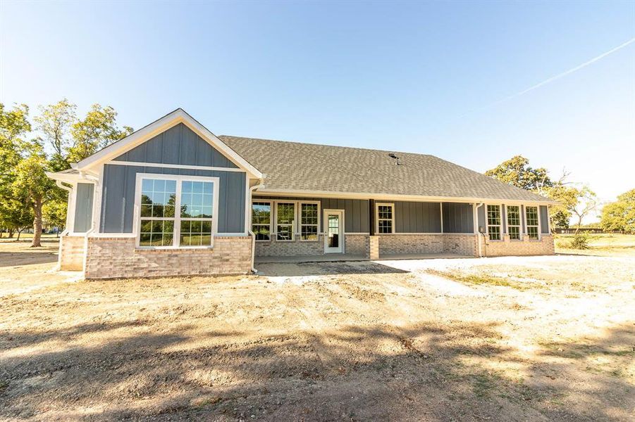 Exterior details and patio area of a home in , Post Oak Bend City (Image 3).