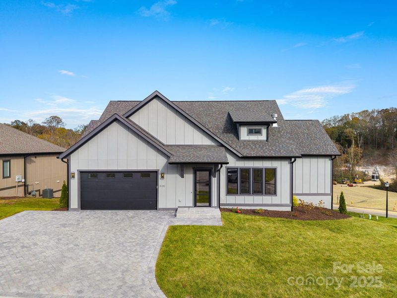 Front exterior of a new home in , Arden, NC, highlighting curb appeal (Image 28). Front exterior of a new home in , Arden, NC, highlighting curb appeal (Image 28).