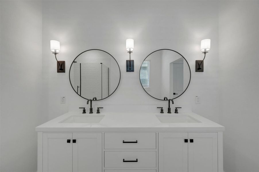 Spa-like primary bath with freestanding vanity Spa-like primary bath with freestanding vanity