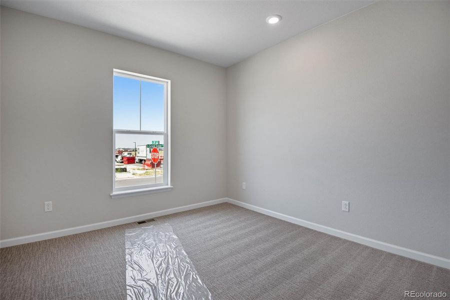 Spacious, unfurnished interior of a new home in Ensemble at The Aurora Highlands, Aurora (Image 34).