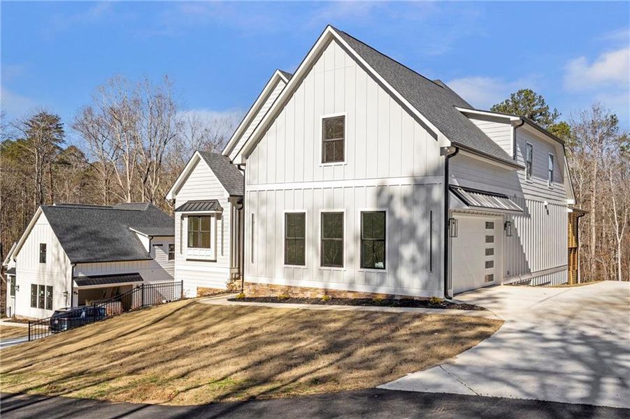 Front exterior of a new home in , Cumming, GA, highlighting curb appeal (Image 25).