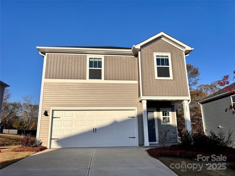 Front exterior of a new home in Seattle Crossing, Shelby, NC, highlighting curb appeal (Image 1).