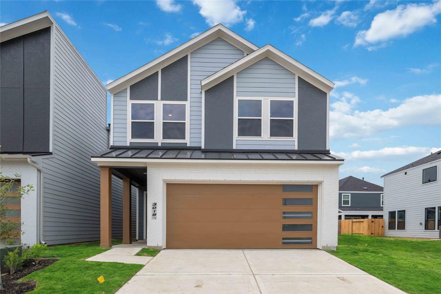 Front exterior of a new home in Alicante, Houston, TX, highlighting curb appeal (Image 2). Front exterior of a new home in Alicante, Houston, TX, highlighting curb appeal (Image 2).