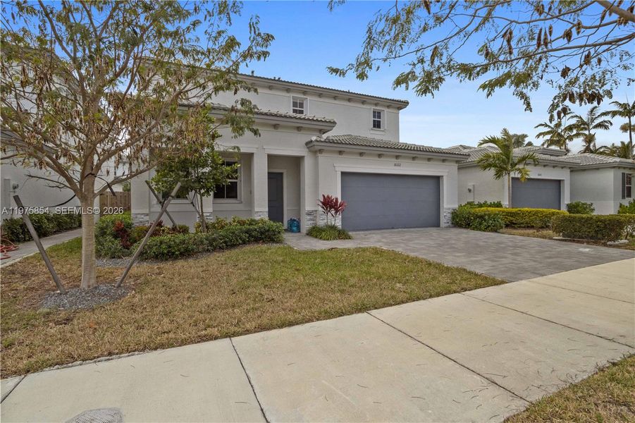 Front exterior of a new home in , Miami, FL, highlighting curb appeal (Image 26).