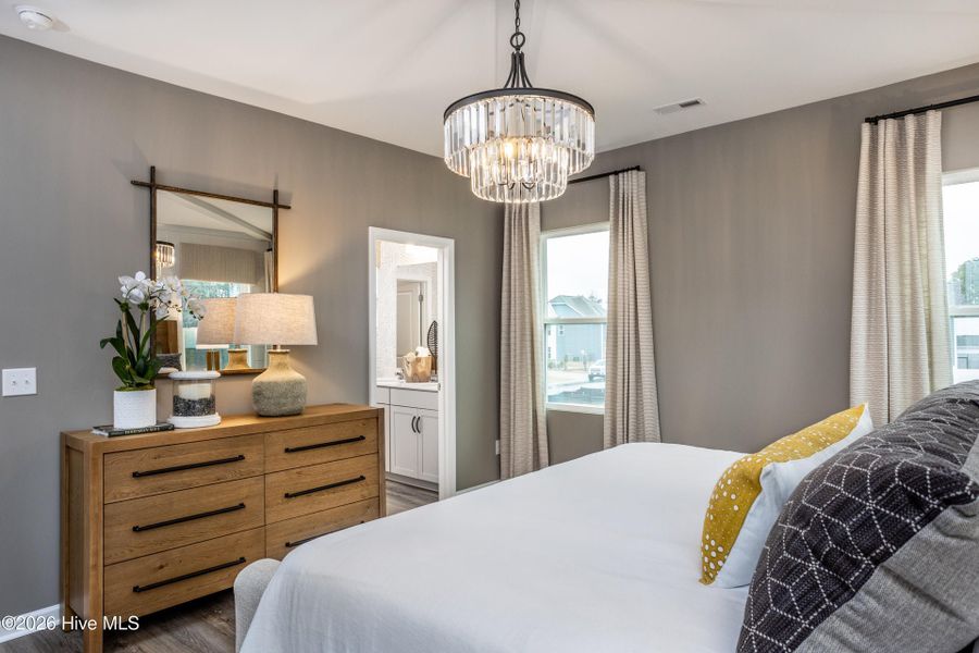 Furnished interior view inside a new home in Coastal Haven Townes, Leland (Image 9).