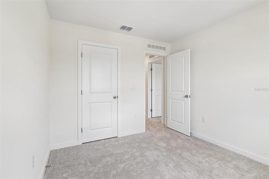 Spacious, unfurnished interior of a new home in Cyrene at Harmony, St. Cloud (Image 17). Spacious, unfurnished interior of a new home in Cyrene at Harmony, St. Cloud (Image 17).