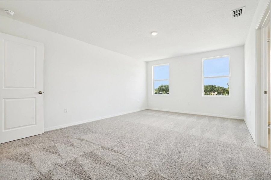 Spacious, unfurnished interior of a new home in Ardisia Park, New Smyrna Beach (Image 23).
