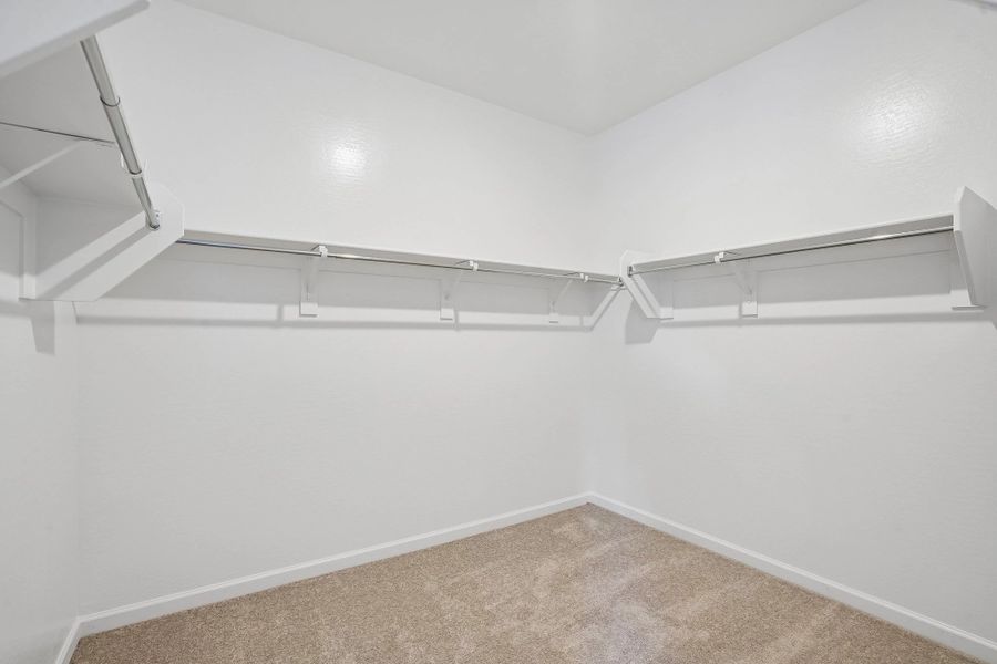 Primary walk in closet Primary walk in closet