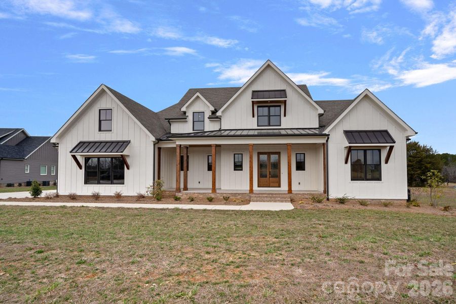 Front exterior of a new home in , Statesville, NC, highlighting curb appeal (Image 1). Front exterior of a new home in , Statesville, NC, highlighting curb appeal (Image 1).