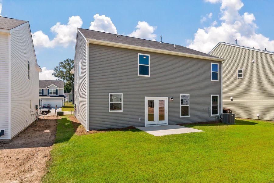 Front exterior of a new home in Oakley Pointe, Moncks Corner, SC, highlighting curb appeal (Image 21).