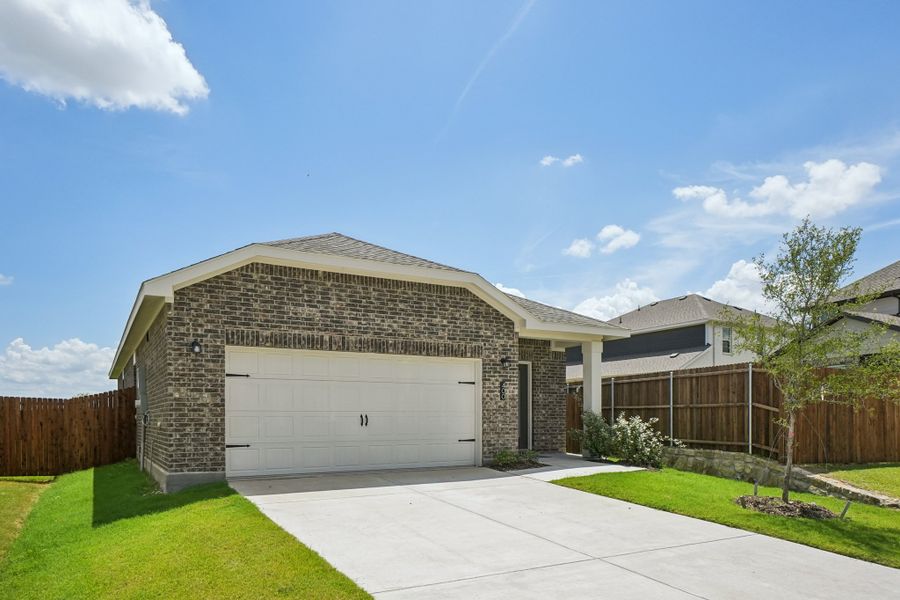 Representative exterior photo of a completed home built from the Enterprise by Starlight Homes in Coyote Meadows, Anna, TX (Image 2). Representative exterior photo of a completed home built from the Enterprise by Starlight Homes in Coyote Meadows, Anna, TX (Image 2).
