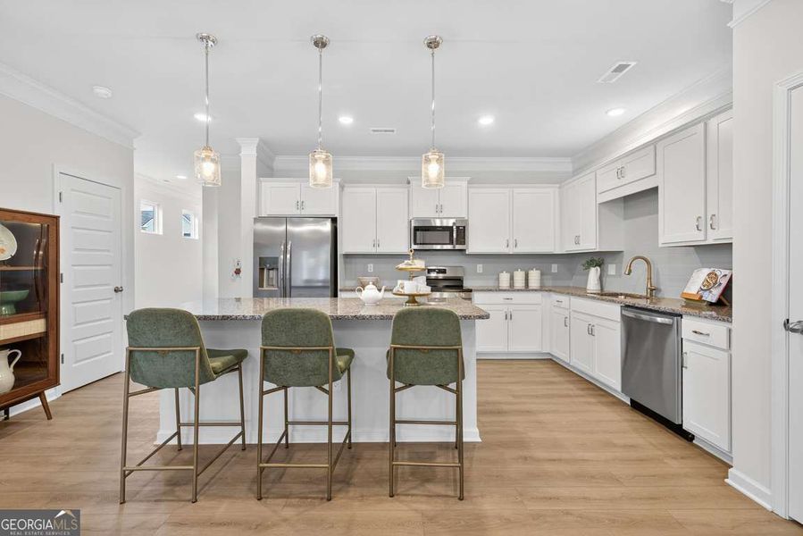 Furnished interior view inside a new home in Crescent Towns, Riverdale (Image 6).