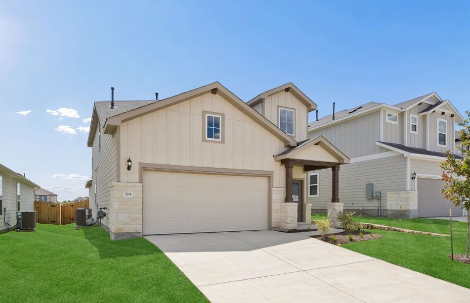 Front exterior of a new home in Sunfield, Buda, TX, highlighting curb appeal (Image 19).
