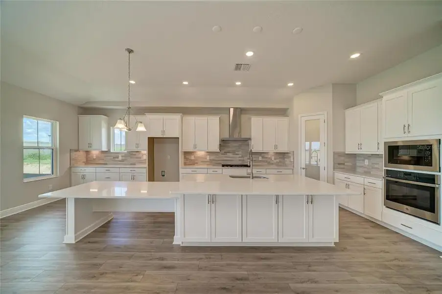 Furnished interior view inside a new home in Pasadena Ridge, Dade City (Image 8).