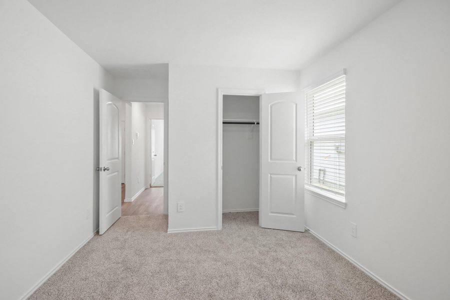 Spacious, unfurnished interior of a new home in Grand Pines, Magnolia (Image 9).