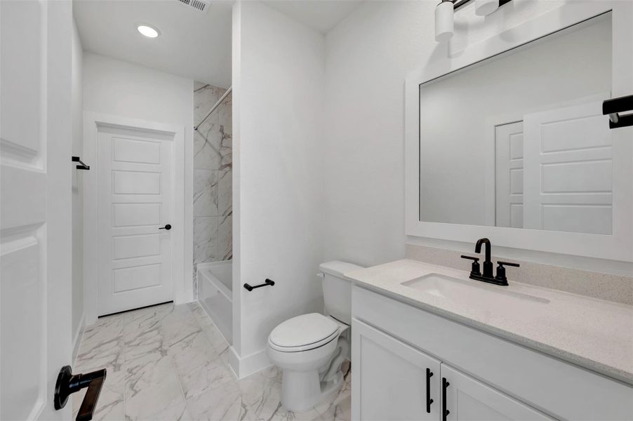 Furnished interior view inside a new home in Sorella, Tomball (Image 7). Furnished interior view inside a new home in Sorella, Tomball (Image 7).