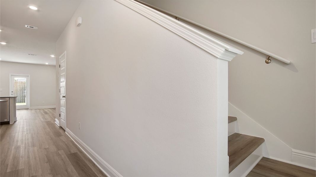 Representative unfurnished interior of a home built from the Palm Interior by D.R. Horton in Caballeros Estates Townhomes at Hombre, Panama City Beach (Image 21). Representative unfurnished interior of a home built from the Palm Interior by D.R. Horton in Caballeros Estates Townhomes at Hombre, Panama City Beach (Image 21).