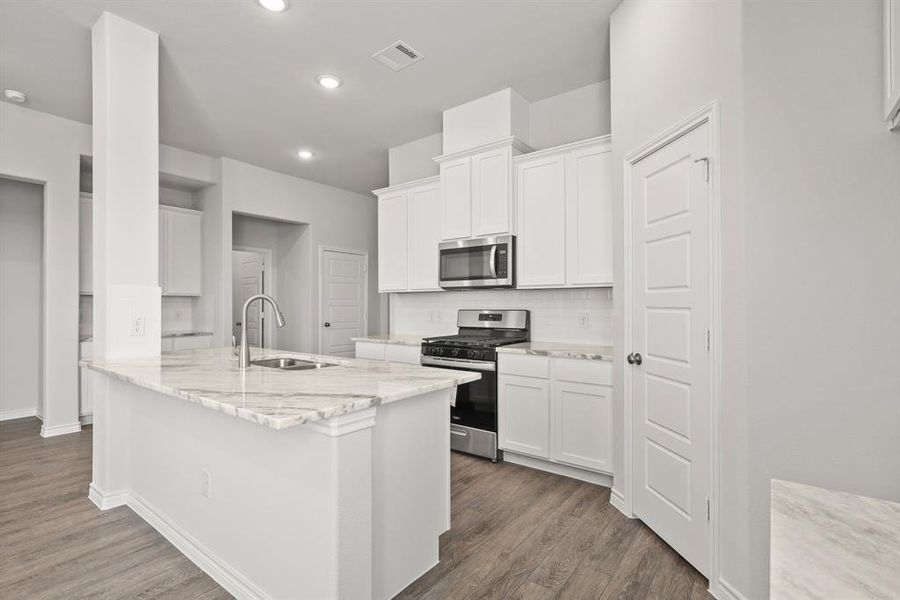 Furnished interior view inside a new home in Rocky Creek Crossing, Fort Worth (Image 8). Furnished interior view inside a new home in Rocky Creek Crossing, Fort Worth (Image 8).