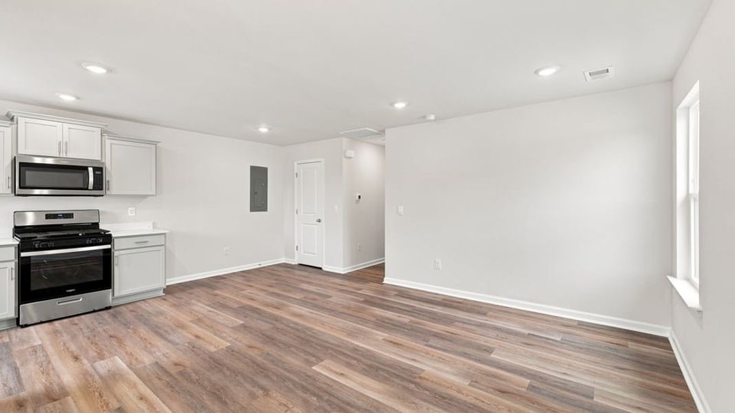 Spacious, unfurnished interior of a new home in Village 3, Woodruff (Image 16).