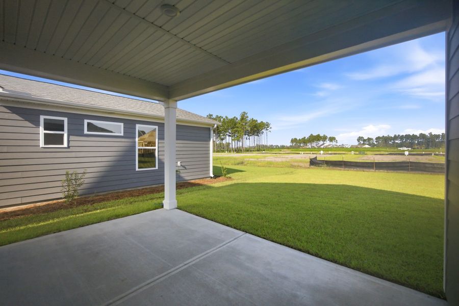 Exterior details and patio area of a home in Terrapin, Leland (Image 17). Exterior details and patio area of a home in Terrapin, Leland (Image 17).