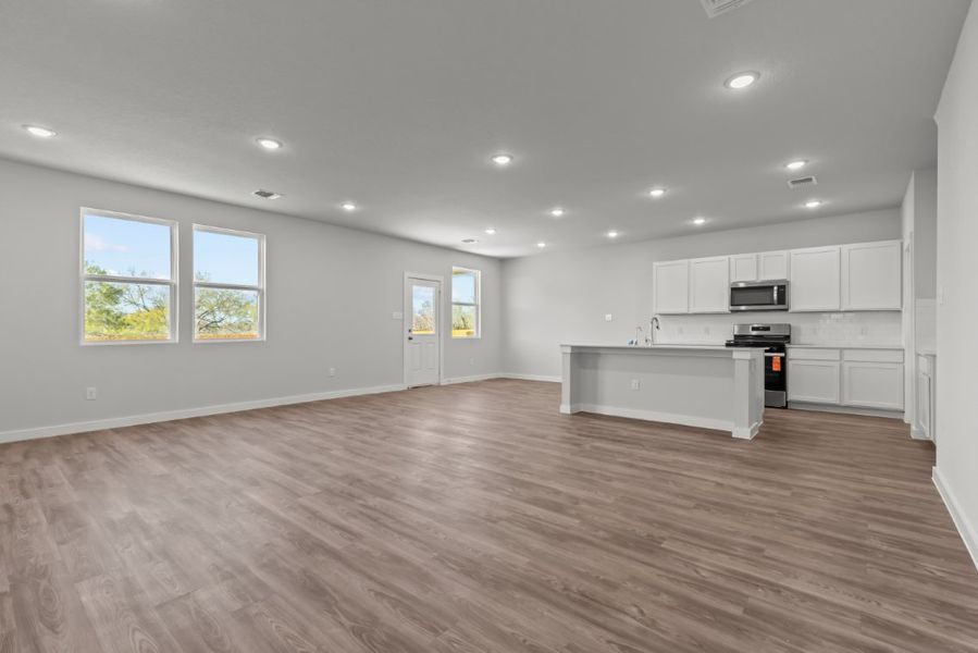 A large empty kitchen. A large empty kitchen.
