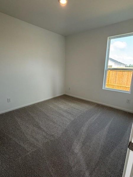 Spacious, unfurnished interior of a new home in Canterra Creek: Classic Collection, Rosharon (Image 6).