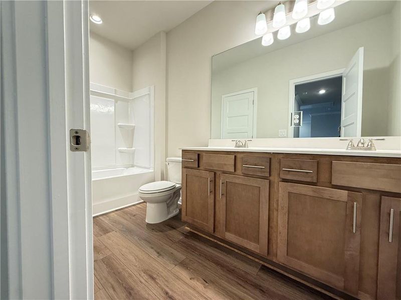 Furnished interior view inside a new home in Ponderosa Farms Manor, Gainesville (Image 12).