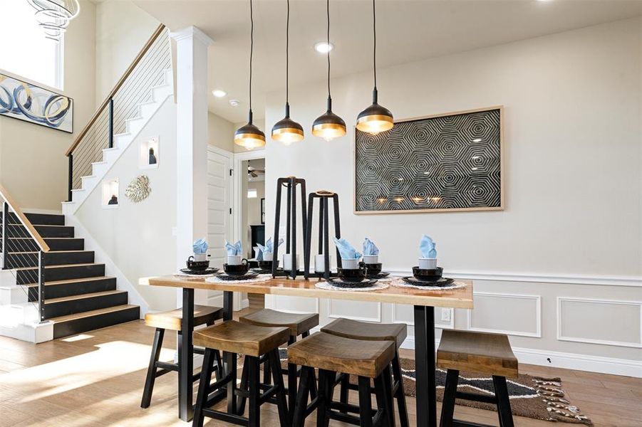 Dining space featuring hardwood / wood-style flooring