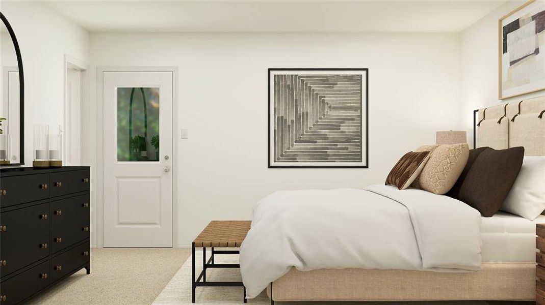 Bedroom featuring light colored carpet