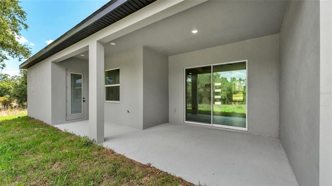 Exterior details and patio area of a home in , Davenport (Image 3).
