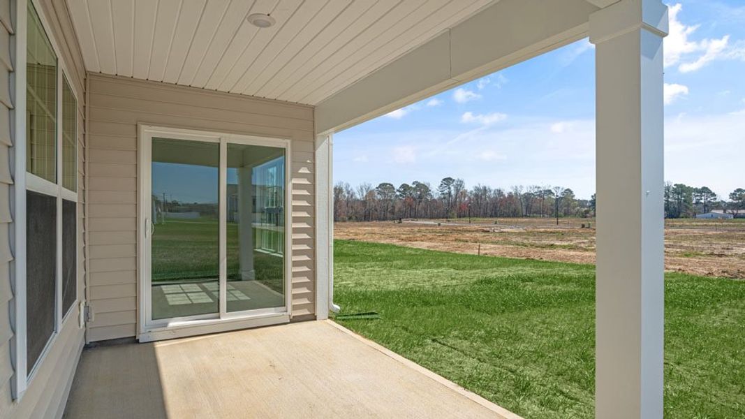 Exterior details and patio area of a home in Madeline Farm, New Bern (Image 3). Exterior details and patio area of a home in Madeline Farm, New Bern (Image 3).