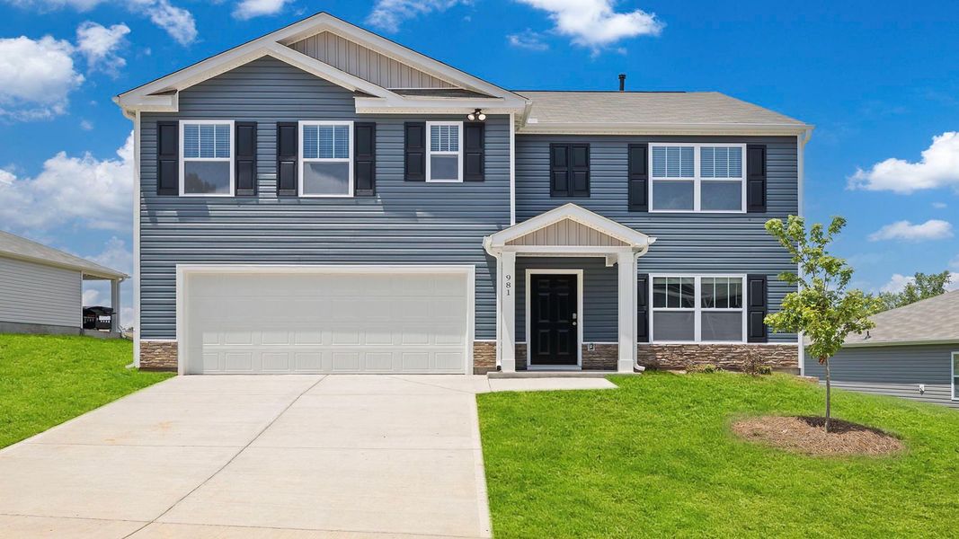 Front exterior of a new home in Lakestone, Woodruff, SC, highlighting curb appeal (Image 1).