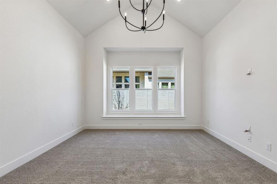 Featuring dramatic ceilings, beautiful chandelier and a dreamy built in window seat, this peaceful and relaxing owner's suite is waiting for you to call it your own!